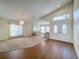 Spacious living area with hardwood and carpeted floors at 9519 Green Needle Dr, New Port Richey, FL 34655
