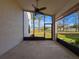 Screened patio with view of backyard at 9519 Green Needle Dr, New Port Richey, FL 34655