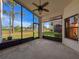 Spacious screened porch overlooking backyard at 9519 Green Needle Dr, New Port Richey, FL 34655
