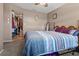 Bedroom with double bed, walk-in closet, and ceiling fan at 10620 Salamanca Dr, Port Richey, FL 34668