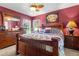 Main bedroom with wood furniture and large windows at 10620 Salamanca Dr, Port Richey, FL 34668