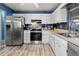 Kitchen with stainless steel appliances and ample cabinet space at 10620 Salamanca Dr, Port Richey, FL 34668