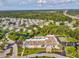 Community overview showcasing clubhouse, pool, and landscaping at 11509 Sinatra Ct, New Port Richey, FL 34654