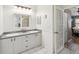 Double vanity bathroom with updated countertops and a shower at 11509 Sinatra Ct, New Port Richey, FL 34654