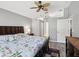 Bright bedroom with king-size bed and access to bathroom at 11509 Sinatra Ct, New Port Richey, FL 34654