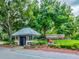 Gated entrance to Summertree with landscaping and signage at 11509 Sinatra Ct, New Port Richey, FL 34654