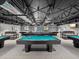 Community billiard room with multiple pool tables at 11509 Sinatra Ct, New Port Richey, FL 34654