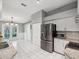 Modern kitchen with stainless steel appliances and granite countertops at 11509 Sinatra Ct, New Port Richey, FL 34654