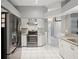 Modern kitchen with stainless steel appliances and granite countertops at 11509 Sinatra Ct, New Port Richey, FL 34654