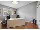 Home office with wood floors and a large desk at 11509 Sinatra Ct, New Port Richey, FL 34654