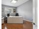 Home office with wood floors and a large desk at 11509 Sinatra Ct, New Port Richey, FL 34654