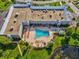 Relax by the refreshing community pool with lounge chairs at 11509 Sinatra Ct, New Port Richey, FL 34654