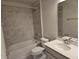 Bathroom with tub, toilet and double vanity at 12466 Amber Creek Cir, Lakewood Ranch, FL 34211