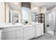 Modern bathroom with double vanity, large shower, and elegant finishes at 12466 Amber Creek Cir, Lakewood Ranch, FL 34211