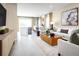 Open-concept living space featuring a neutral color palette and modern furnishings at 12466 Amber Creek Cir, Lakewood Ranch, FL 34211