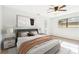 Comfortable bedroom featuring a double bed and ensuite bathroom access at 1314 Vermont Ave, Tarpon Springs, FL 34689