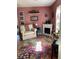 Cozy living room featuring a fireplace and comfy seating at 13219 Greenview Ct, Hudson, FL 34669