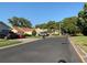Residential community with houses and well-maintained streets at 13219 Greenview Ct, Hudson, FL 34669
