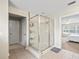 Modern bathroom with a large walk-in shower at 14143 Wake Robin Dr, Brooksville, FL 34604