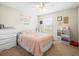 Cozy bedroom with a comfortable bed and decor at 14143 Wake Robin Dr, Brooksville, FL 34604