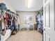 Large walk-in closet with ample shelving and hanging space at 14143 Wake Robin Dr, Brooksville, FL 34604