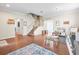 Spacious living area featuring hardwood floors and a staircase at 14143 Wake Robin Dr, Brooksville, FL 34604