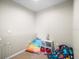 Playroom with beanbag chairs and a toy storage unit at 14143 Wake Robin Dr, Brooksville, FL 34604