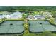 Enjoy resort-style amenities with these lighted tennis courts at 19502 Forest Garden Ct, Brooksville, FL 34601