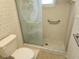 Bathroom with walk-in shower and grab bars at 2019 Monica Ave, Spring Hill, FL 34609