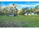 Property features a house, pool, and large backyard at 21000 Nina Ln, Brooksville, FL 34601