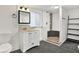 Updated bathroom with white vanity and walk-in shower at 21000 Nina Ln, Brooksville, FL 34601