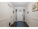 Bright entryway with hardwood floors and white walls at 2413 Hazelwood Ln, Clearwater, FL 33763