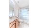 Clean bathroom, featuring a walk-in shower and wood vanity at 262 Hartford Ct, Spring Hill, FL 34609