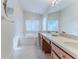 Bathroom with double vanity and garden tub at 262 Hartford Ct, Spring Hill, FL 34609