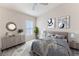 Bedroom with dresser, bed and artwork at 262 Hartford Ct, Spring Hill, FL 34609