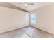 Bright bedroom with ceiling fan and neutral wall colors at 262 Hartford Ct, Spring Hill, FL 34609