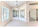Bright breakfast nook with tile floor and view to backyard at 262 Hartford Ct, Spring Hill, FL 34609