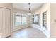 Bright breakfast nook with tile floor and view to backyard at 262 Hartford Ct, Spring Hill, FL 34609