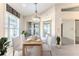 Breakfast nook featuring a table set for four with view to backyard at 262 Hartford Ct, Spring Hill, FL 34609