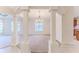 Bright dining room with chandelier and large windows at 262 Hartford Ct, Spring Hill, FL 34609
