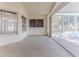Bright enclosed patio with sliding doors and neutral flooring at 262 Hartford Ct, Spring Hill, FL 34609