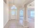 Spacious entryway with tile floors and view to living room at 262 Hartford Ct, Spring Hill, FL 34609