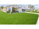 Single-story home with well-manicured lawn and attached garage at 262 Hartford Ct, Spring Hill, FL 34609