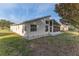 Single story home with sunroom and landscaped yard at 262 Hartford Ct, Spring Hill, FL 34609