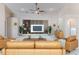 Living room with stylish furniture and large TV at 262 Hartford Ct, Spring Hill, FL 34609