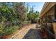 Landscaped backyard with stone path at 29703 69Th N St, Clearwater, FL 33761