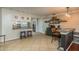 Kitchen with breakfast bar and stainless steel appliances at 29703 69Th N St, Clearwater, FL 33761