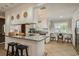 Kitchen with granite counters, breakfast nook, and stainless steel appliances at 29703 69Th N St, Clearwater, FL 33761