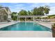 Inviting swimming pool with outdoor kitchen at 29850 Dan Brown Hill Rd, Dade City, FL 33523