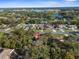 Aerial view showing home's location in a residential neighborhood at 3131 Deltona Blvd, Spring Hill, FL 34606